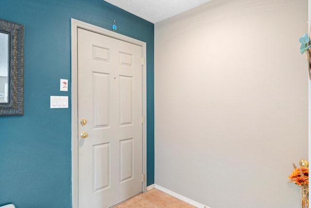 view of tiled foyer