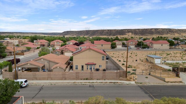 drone / aerial view featuring a mountain view