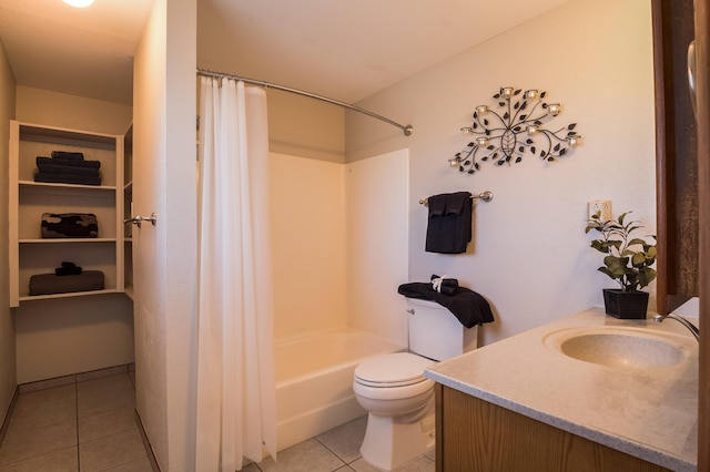 full bathroom featuring tile patterned flooring, vanity, toilet, and shower / bath combo with shower curtain