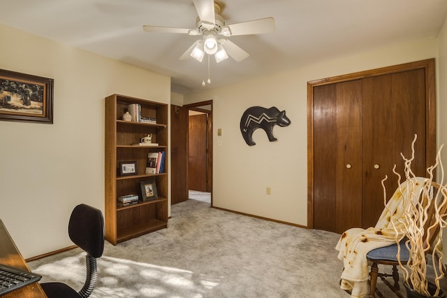 interior space with ceiling fan and light carpet