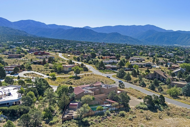 drone / aerial view featuring a mountain view