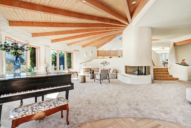 interior space featuring parquet floors, a multi sided fireplace, wood ceiling, and vaulted ceiling with beams