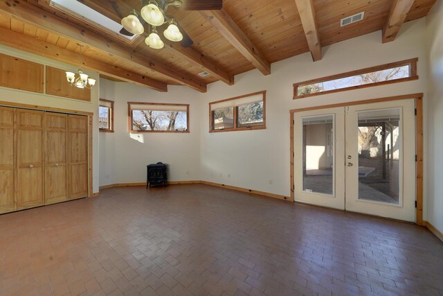 interior space with wooden ceiling, french doors, and ceiling fan