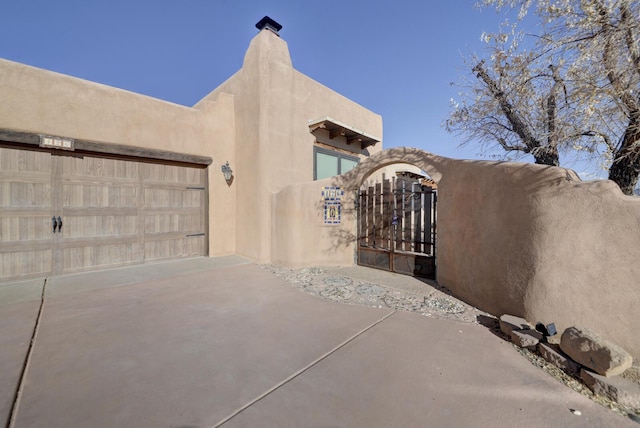 view of property exterior with a garage