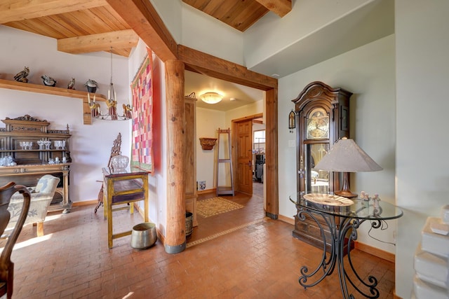 hallway featuring beamed ceiling and wooden ceiling