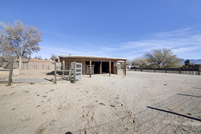 426 Ruffles Ln, Corrales, NM 87048 - back of property with an exterior structure and an outbuilding