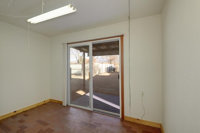 unfurnished room featuring a wall mounted air conditioner