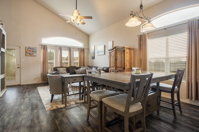 dining space featuring ceiling fan, dark hardwood / wood-style floors, and high vaulted ceiling