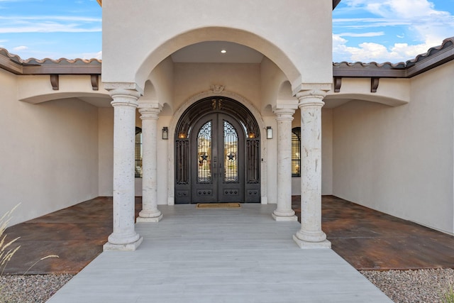 view of exterior entry with french doors