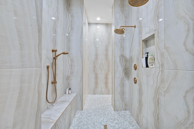 bathroom with a tile shower