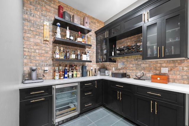 bar with light tile patterned floors and wine cooler