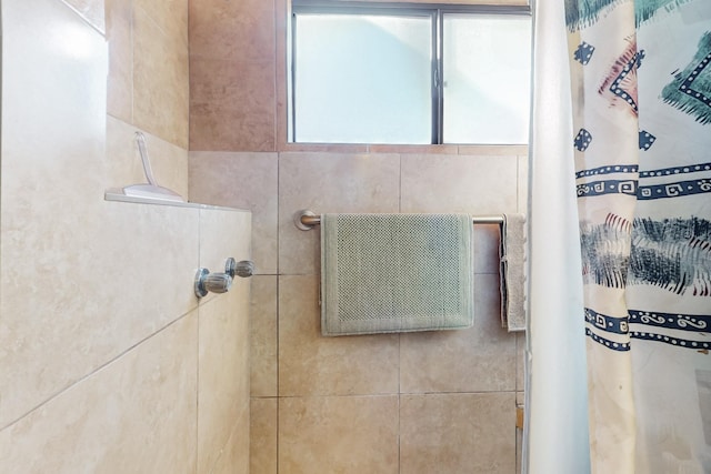 bathroom featuring curtained shower