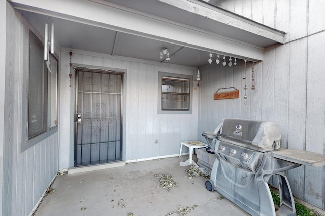 view of patio featuring a grill