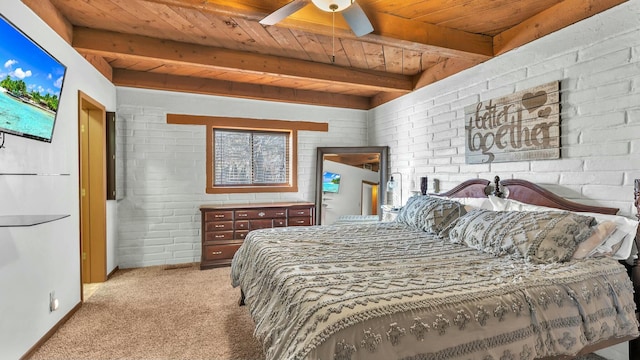 carpeted bedroom with beamed ceiling, wood ceiling, and brick wall