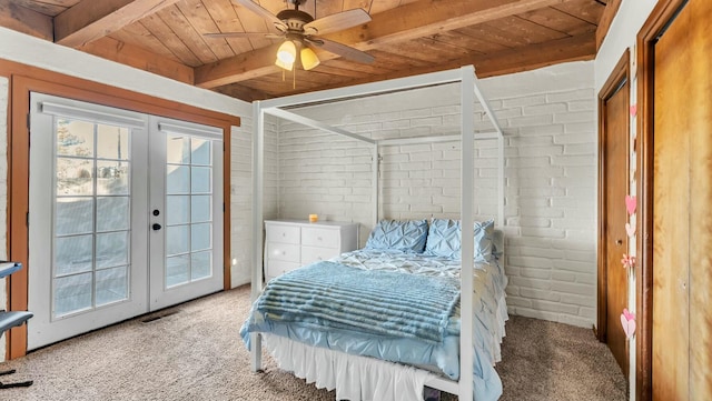 carpeted bedroom featuring brick wall, beam ceiling, access to exterior, and wooden ceiling