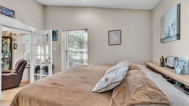 bedroom with light tile patterned flooring