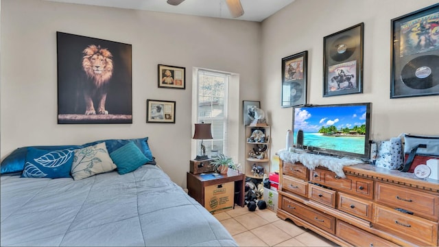 bedroom featuring light tile patterned flooring and ceiling fan