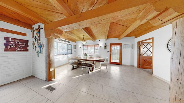 rec room with lofted ceiling with beams, light tile patterned floors, and wooden ceiling