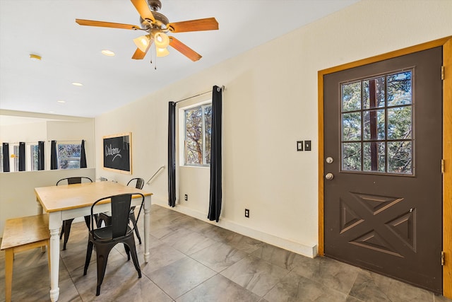 dining area with plenty of natural light, baseboards, a ceiling fan, and recessed lighting