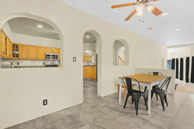 dining room featuring ceiling fan and recessed lighting