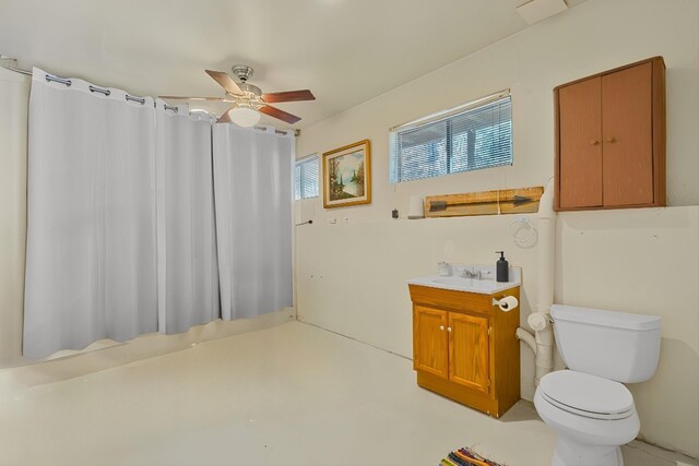 full bathroom with vanity, toilet, and a ceiling fan