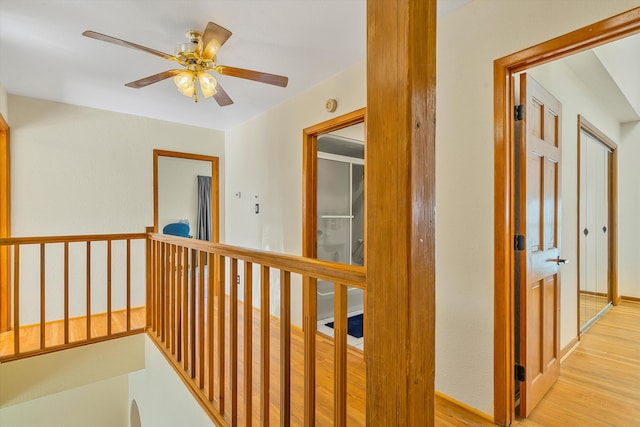 corridor with light wood finished floors