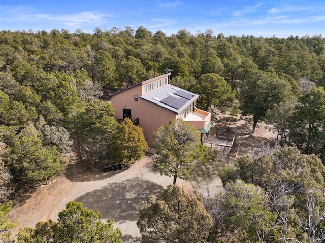 drone / aerial view with a forest view