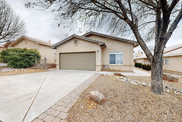 single story home featuring a garage