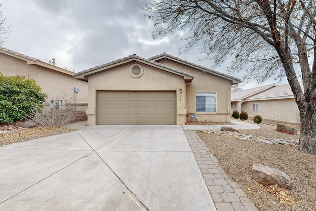 single story home featuring a garage