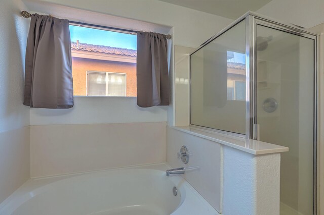 bathroom with plus walk in shower