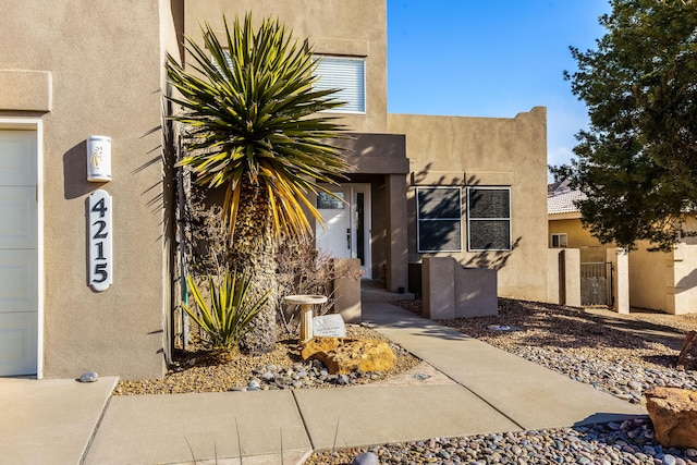 property entrance featuring a garage