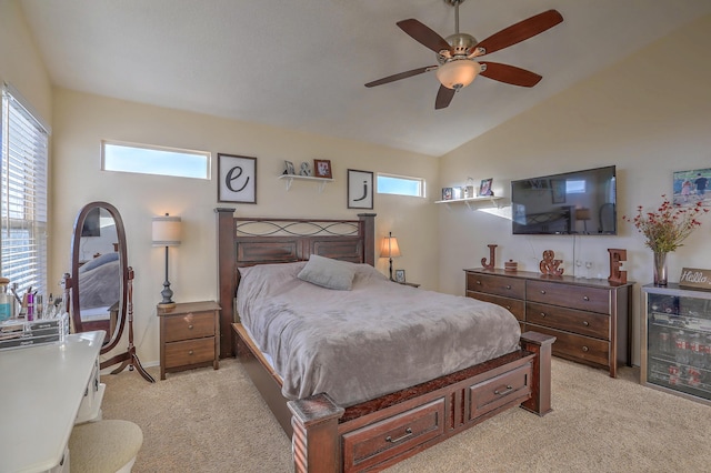 bedroom featuring lofted ceiling, light carpet, and ceiling fan