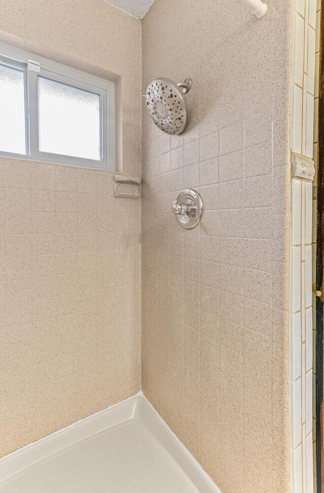 bathroom featuring vanity, tile walls, and tile patterned floors