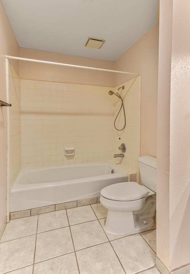 unfurnished room with ceiling fan, light colored carpet, and a textured ceiling