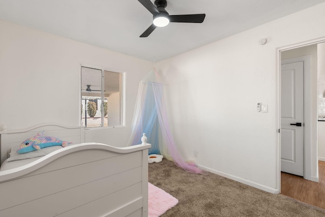 bedroom with ceiling fan and carpet