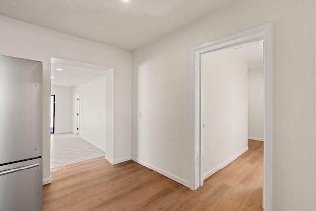 hallway featuring light wood-type flooring