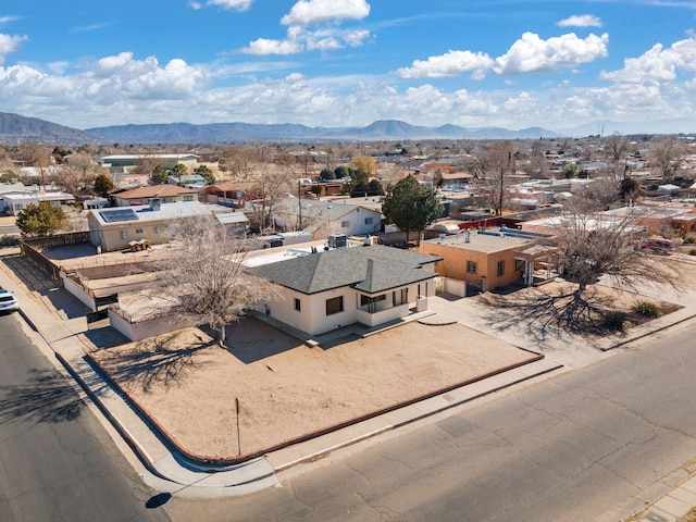 drone / aerial view featuring a mountain view