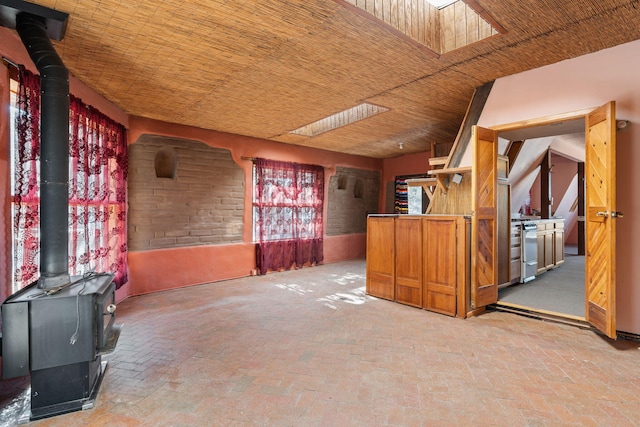 interior space with a wood stove