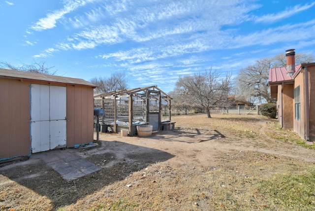 view of yard with a storage shed