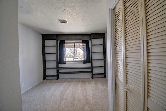 interior space with a textured ceiling