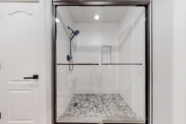 bathroom with an enclosed shower