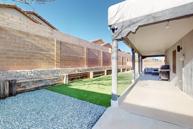 view of yard with an outdoor hangout area and a patio