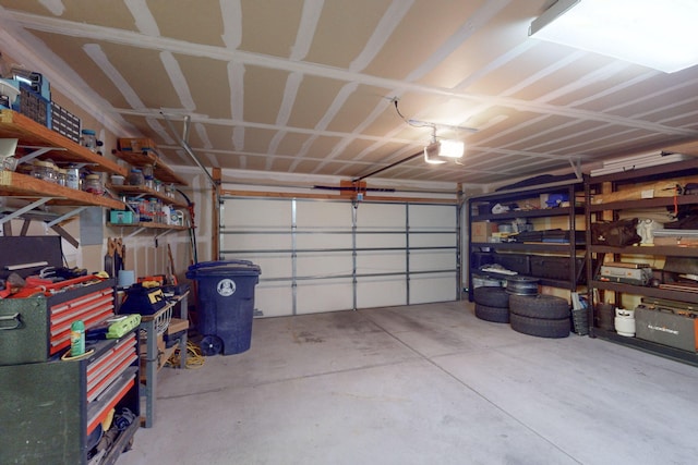 garage featuring a garage door opener