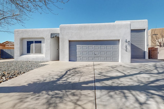 adobe home with a garage