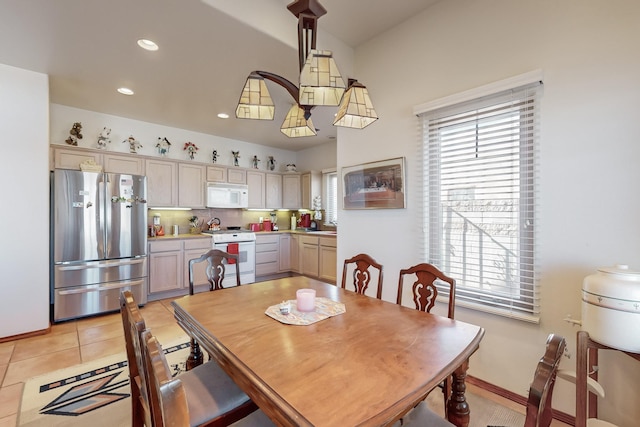 dining room featuring light tile patterned flooring