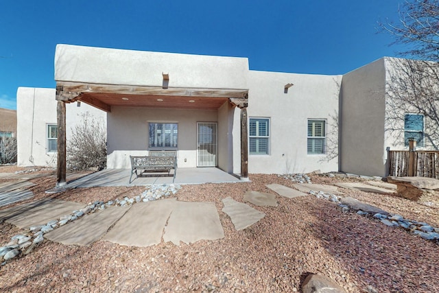 back of house featuring a patio area