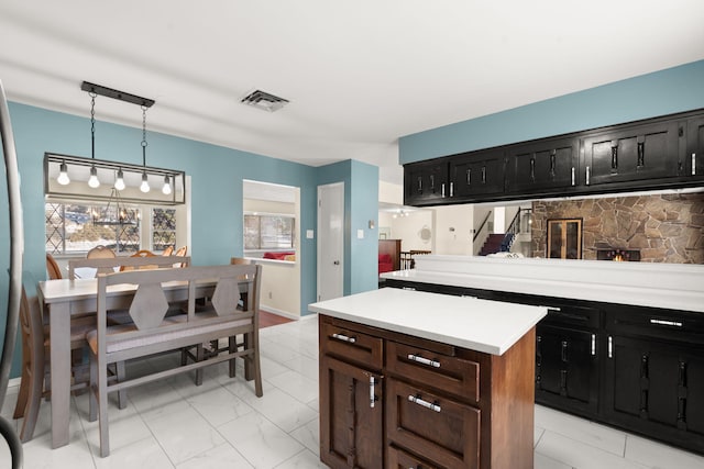 kitchen featuring a center island and pendant lighting