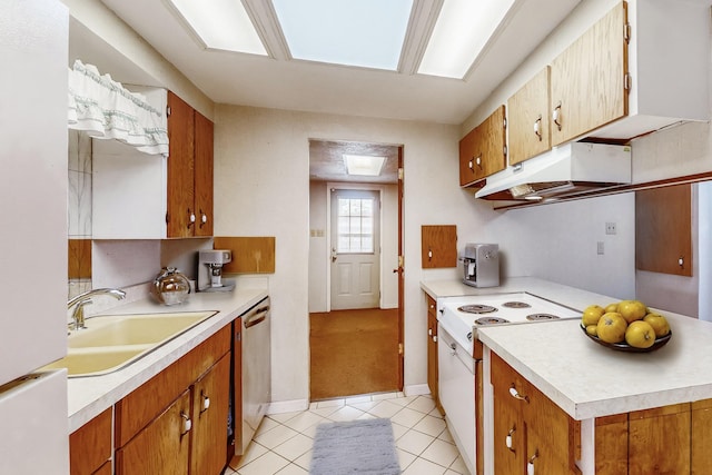 kitchen featuring dishwasher, sink, light tile patterned floors, and white range with electric cooktop