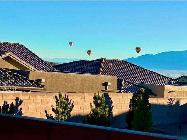 view of property exterior featuring a mountain view