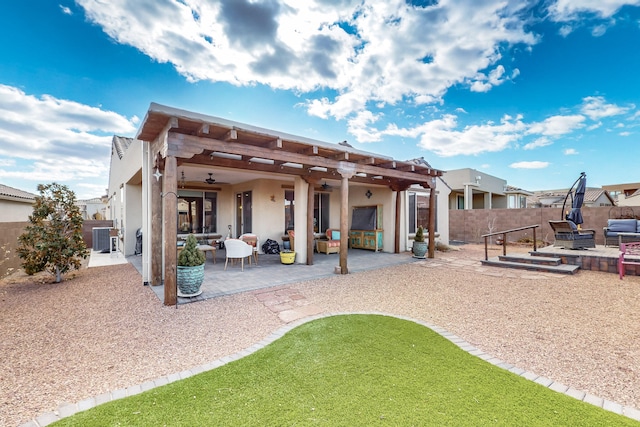 rear view of house featuring ceiling fan, a pergola, a patio, and central air condition unit